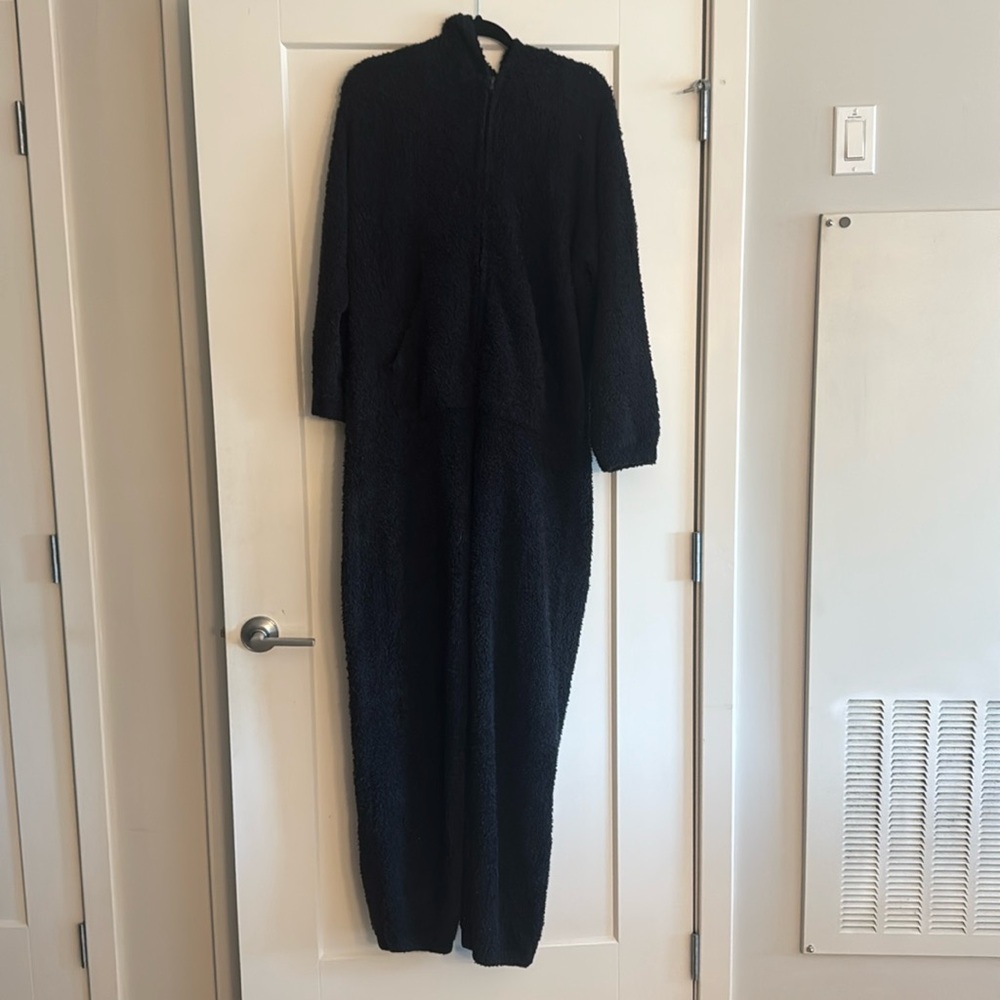 SKIMS black cozy onsie jumpsuit with hood